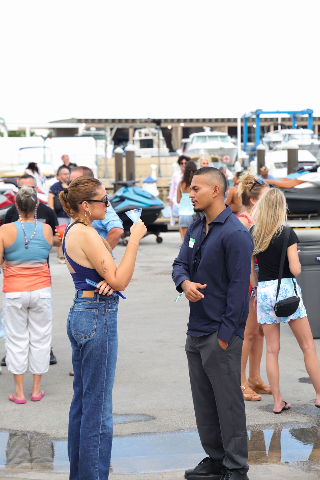 Guests networking at The Triton's Crew, Captains & Connections event at Nautical Ventures Marina.