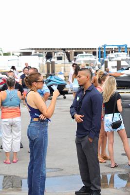 Guests networking at The Triton's Crew, Captains & Connections event at Nautical Ventures Marina.