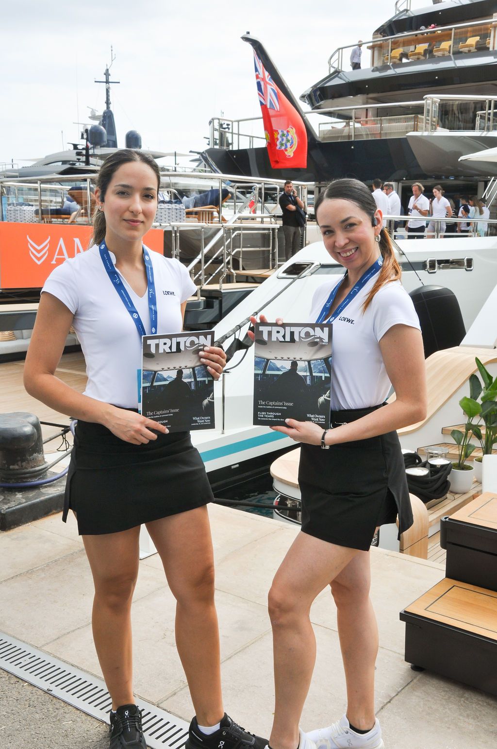 Yachts and crew on the docks at the 2026 Monaco Yacht Show in Port Hercule, Monaco.