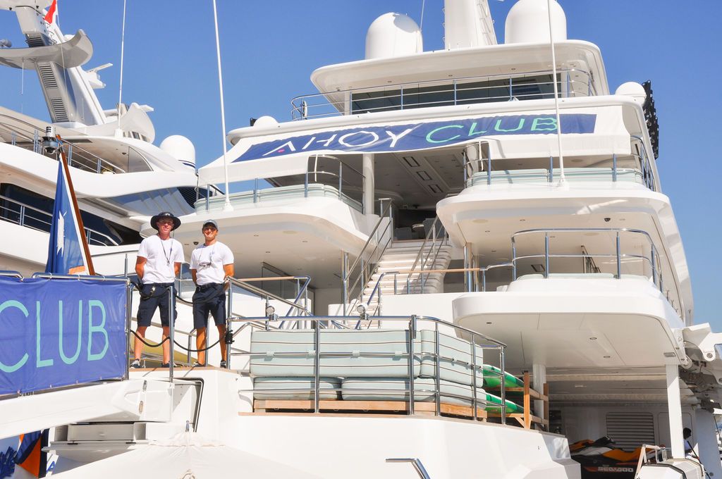 Yachts and crew on the docks at the 2026 Monaco Yacht Show in Port Hercule, Monaco.