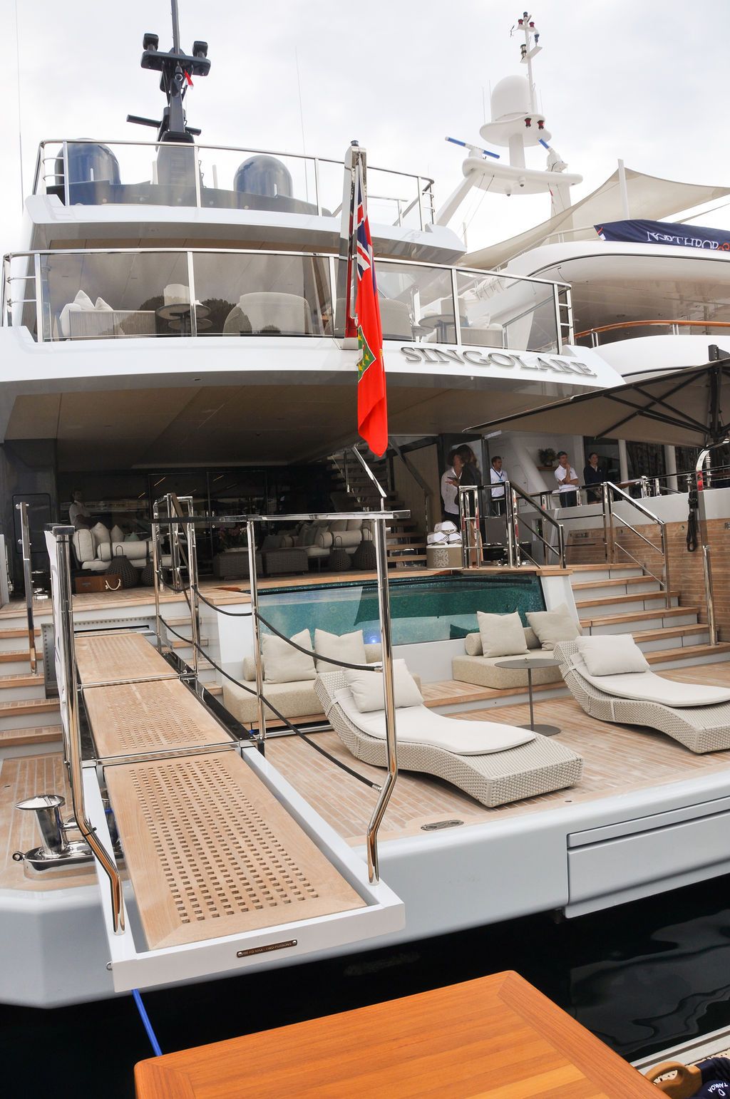 Yachts and crew on the docks at the 2026 Monaco Yacht Show in Port Hercule, Monaco.