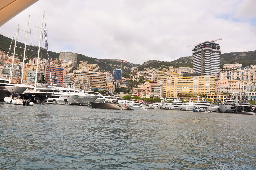 Yachts and crew on the docks at the 2026 Monaco Yacht Show in Port Hercule, Monaco.