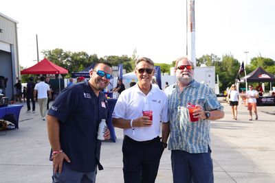 Guests networking at The Triton's Crew, Captains & Connections event at Nautical Ventures Marina.