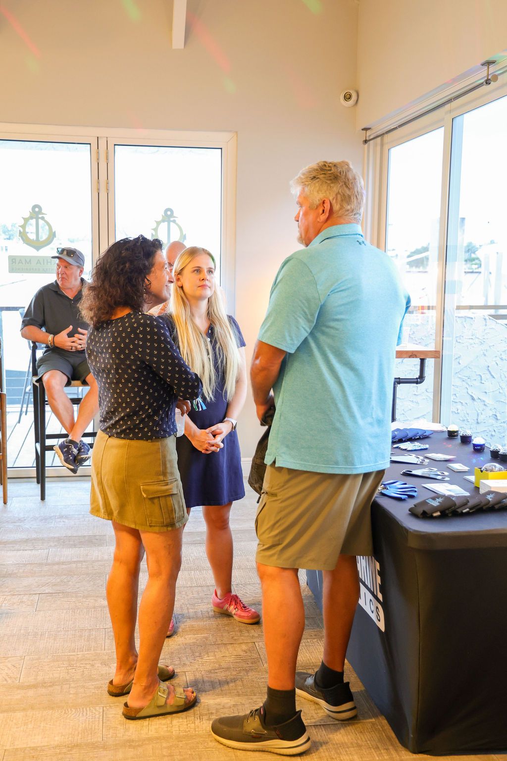 Guests and exhibitors at The Triton's Fall Triton Expo at Bahia Mar Yachting Center.