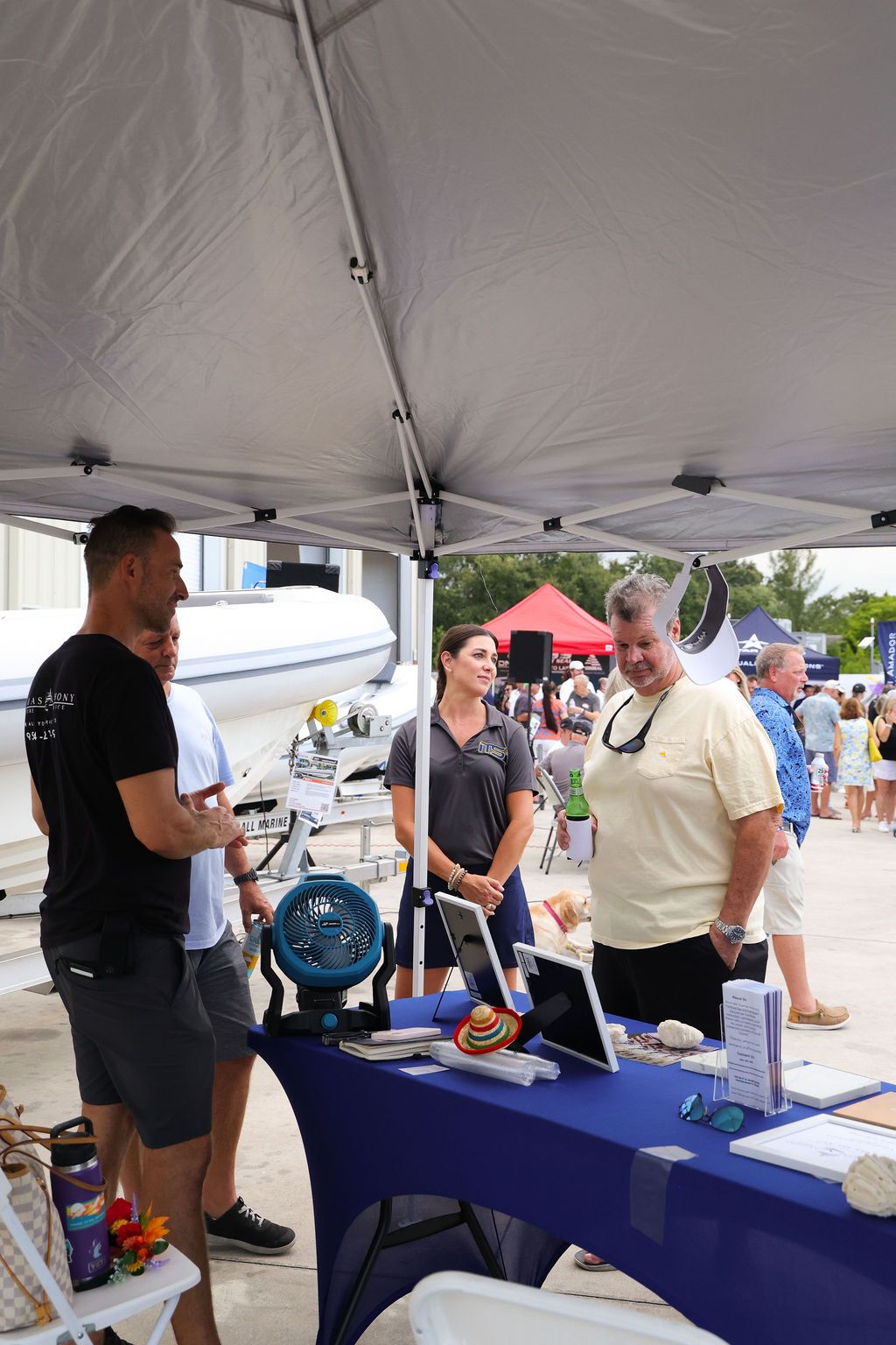 Guests networking at The Triton's Crew, Captains & Connections event at Nautical Ventures Marina.