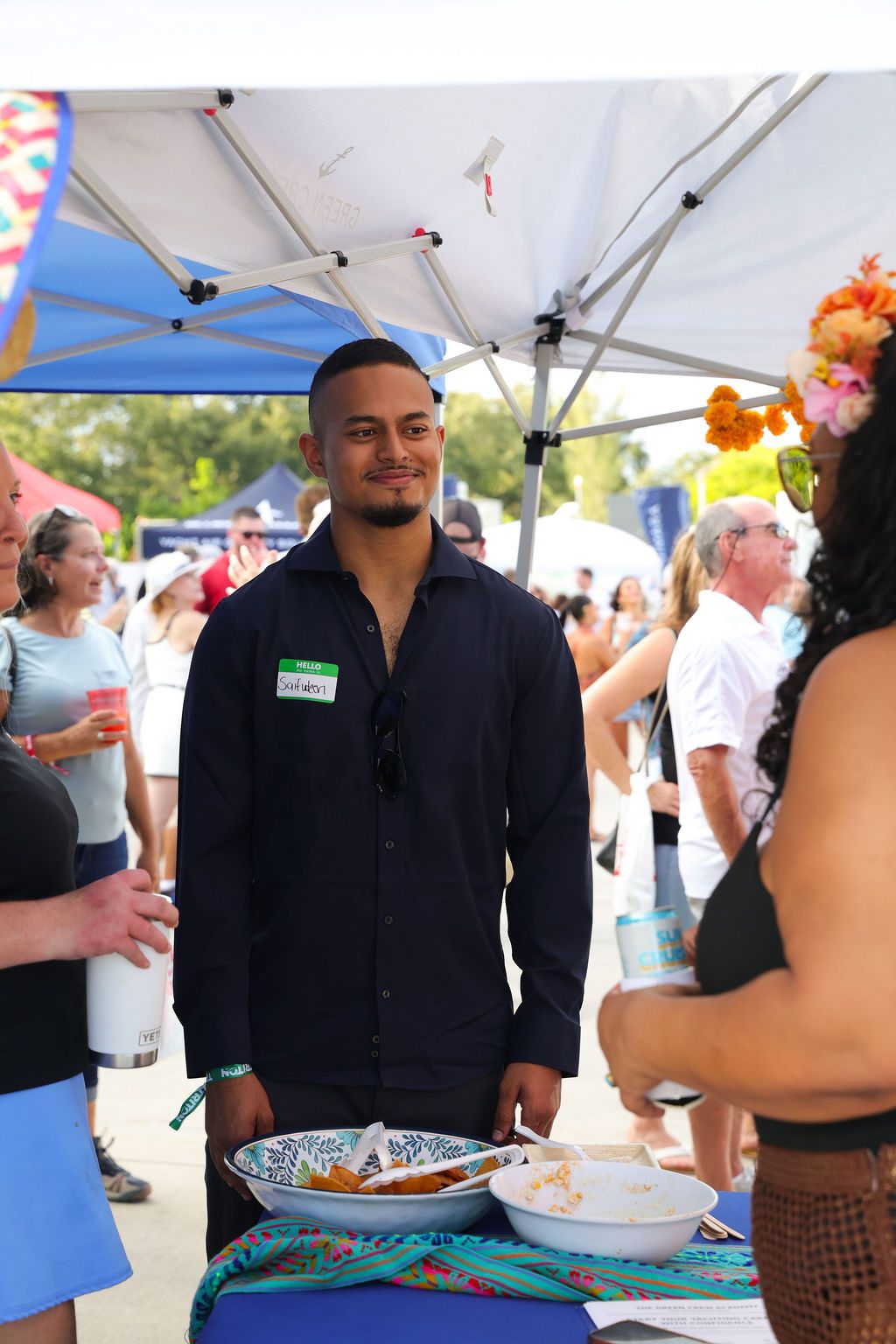 Guests networking at The Triton's Crew, Captains & Connections event at Nautical Ventures Marina.