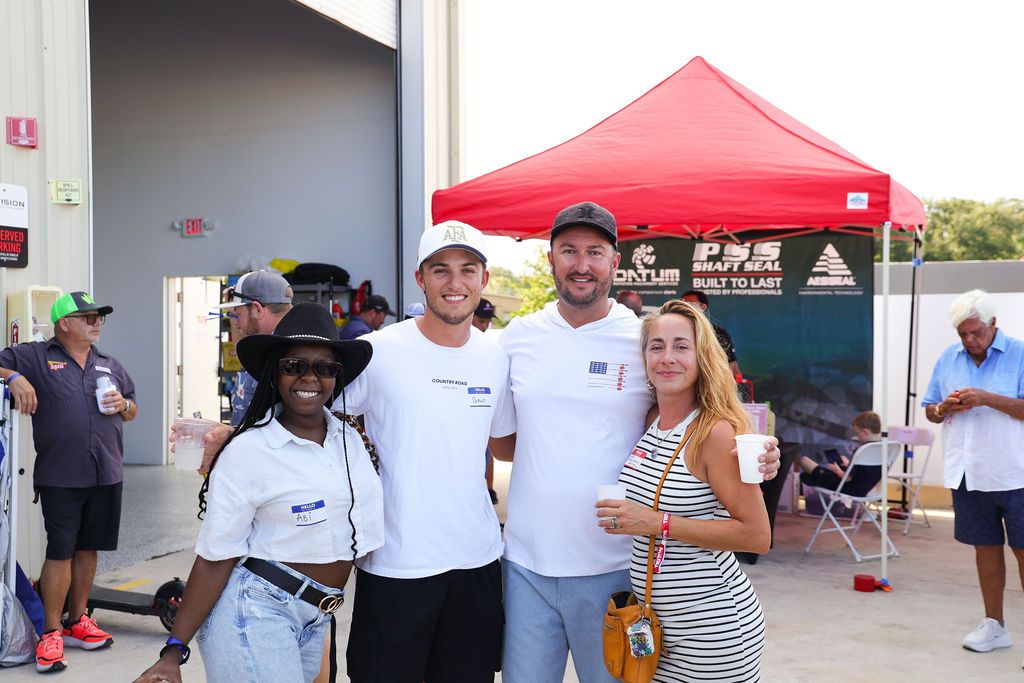 Guests networking at The Triton's Crew, Captains & Connections event at Nautical Ventures Marina.