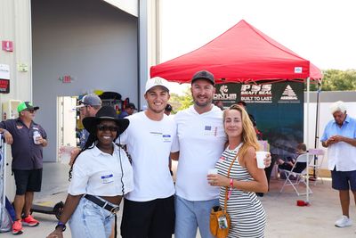 Guests networking at The Triton's Crew, Captains & Connections event at Nautical Ventures Marina.
