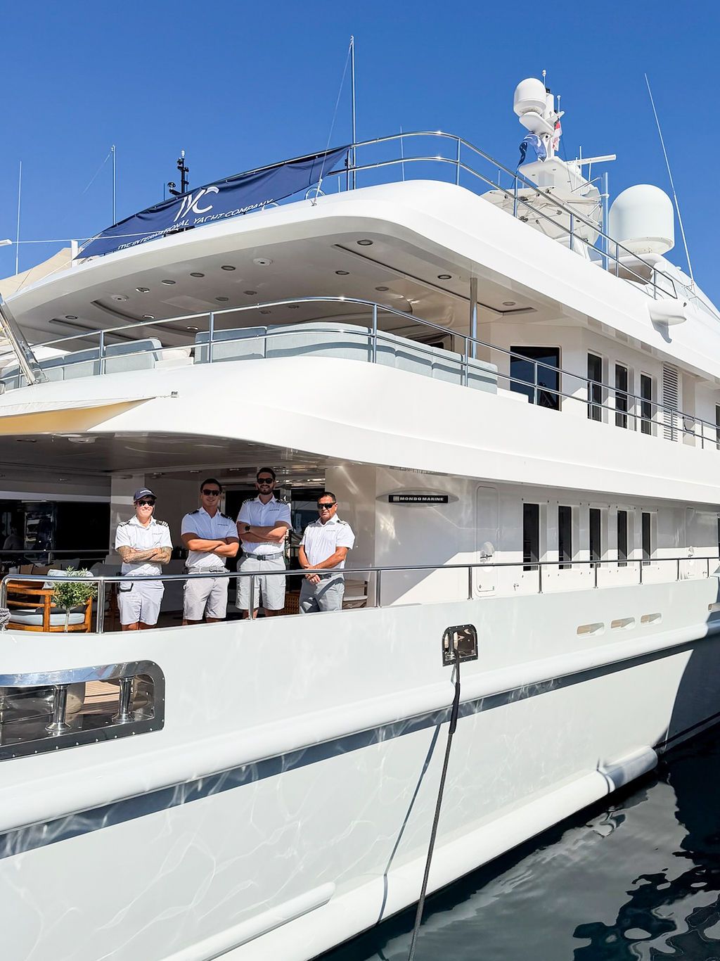 Yachts and crew on the docks at the 2026 Monaco Yacht Show in Port Hercule, Monaco.