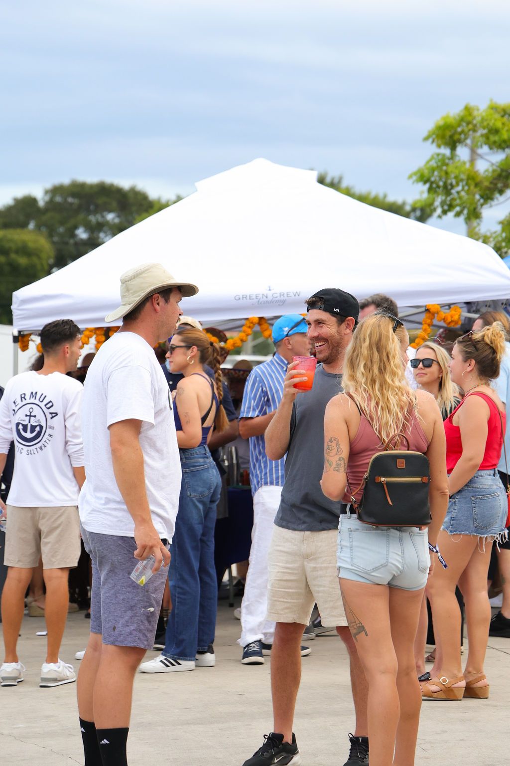 Guests networking at The Triton's Crew, Captains & Connections event at Nautical Ventures Marina.