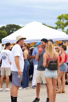 Guests networking at The Triton's Crew, Captains & Connections event at Nautical Ventures Marina.