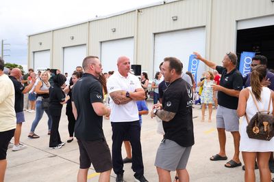 Guests networking at The Triton's Crew, Captains & Connections event at Nautical Ventures Marina.