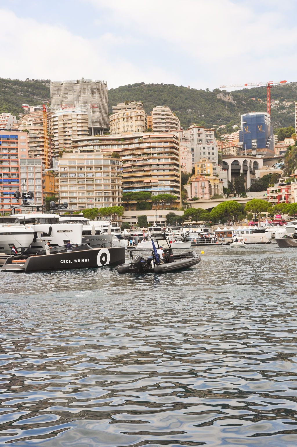 Yachts and crew on the docks at the 2026 Monaco Yacht Show in Port Hercule, Monaco.