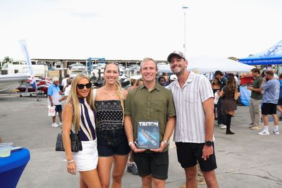 Guests networking at The Triton's Crew, Captains & Connections event at Nautical Ventures Marina.