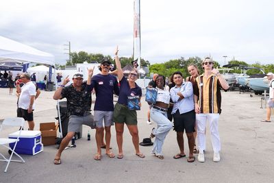 Guests networking at The Triton's Crew, Captains & Connections event at Nautical Ventures Marina.