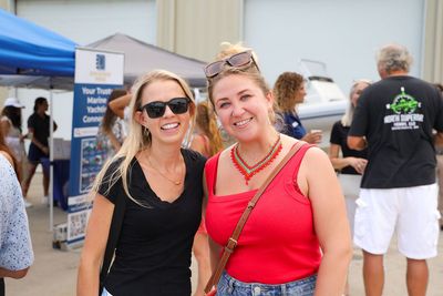 Guests networking at The Triton's Crew, Captains & Connections event at Nautical Ventures Marina.