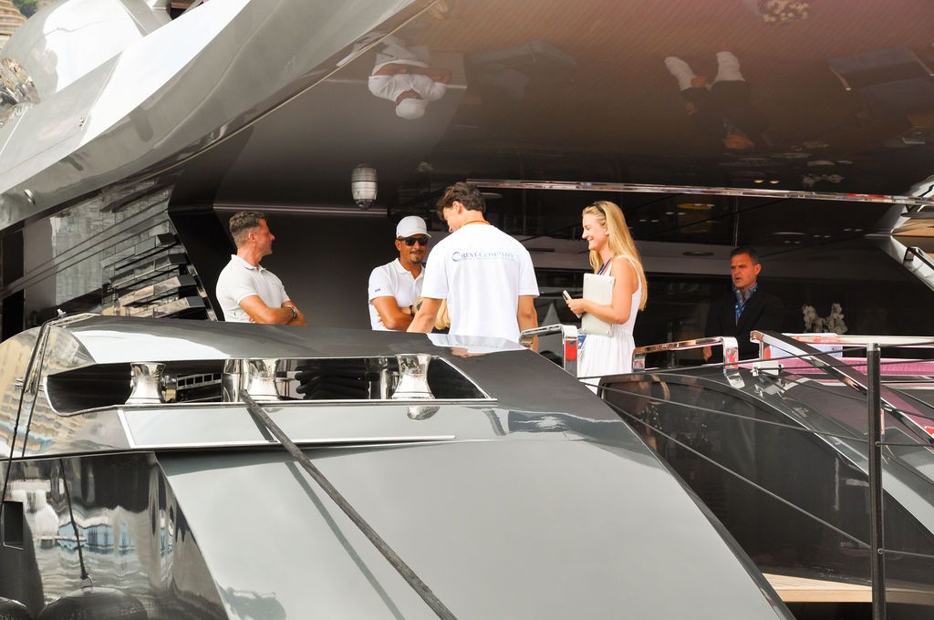 Yachts and crew on the docks at the 2026 Monaco Yacht Show in Port Hercule, Monaco.