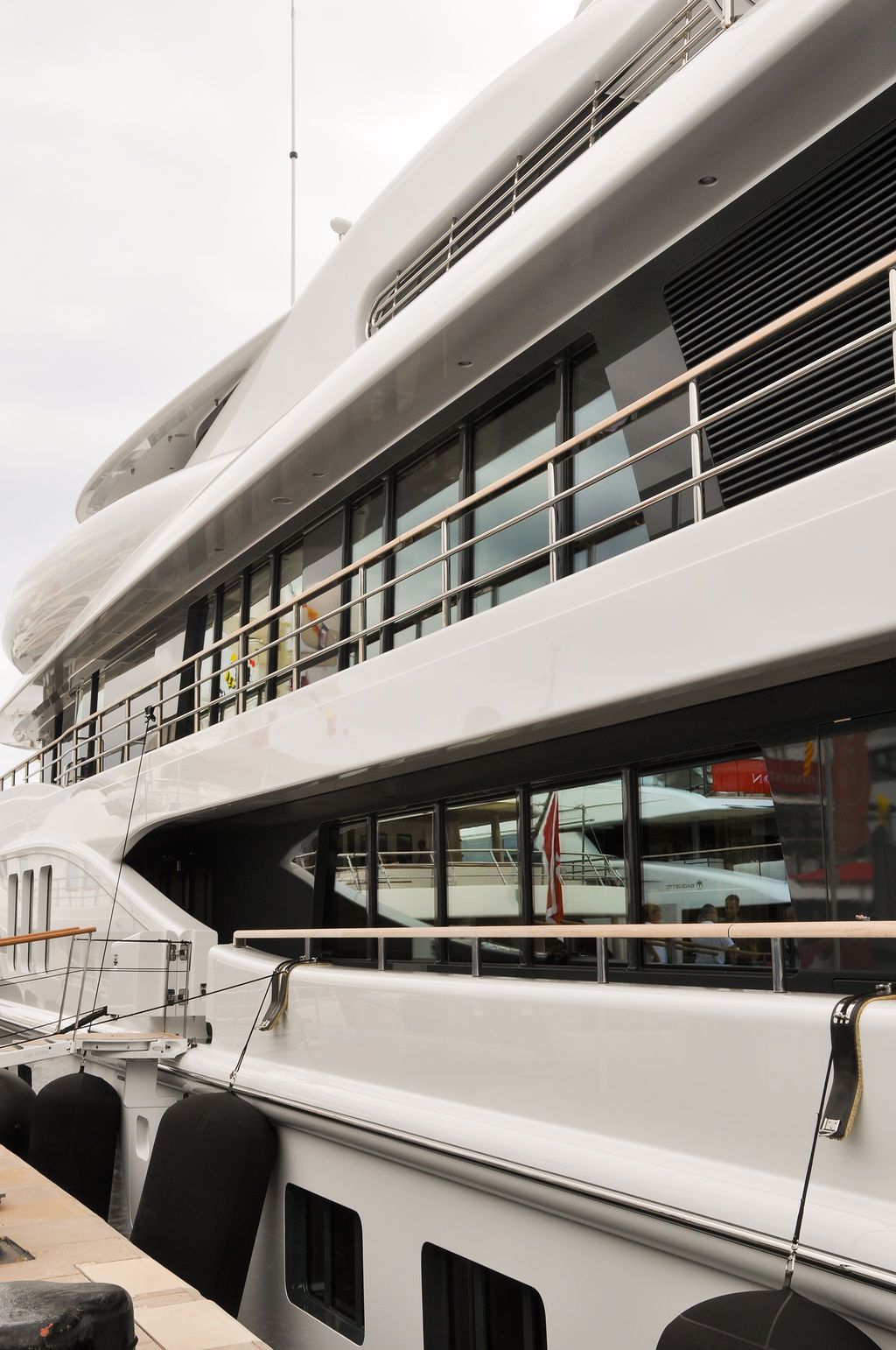 Yachts and crew on the docks at the 2026 Monaco Yacht Show in Port Hercule, Monaco.