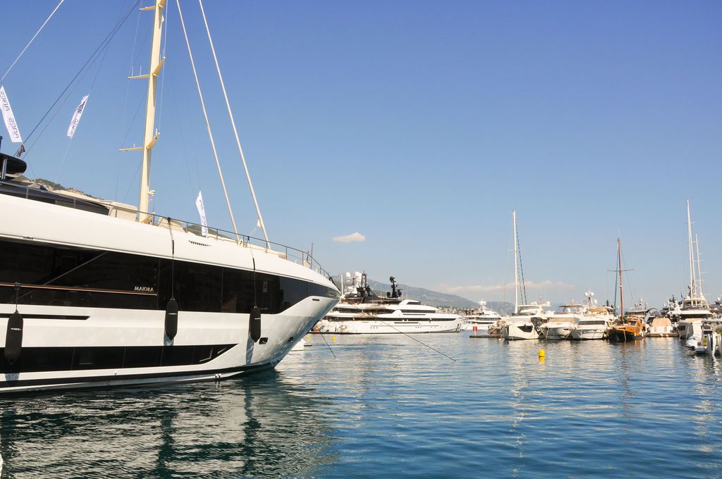 Yachts and crew on the docks at the 2026 Monaco Yacht Show in Port Hercule, Monaco.