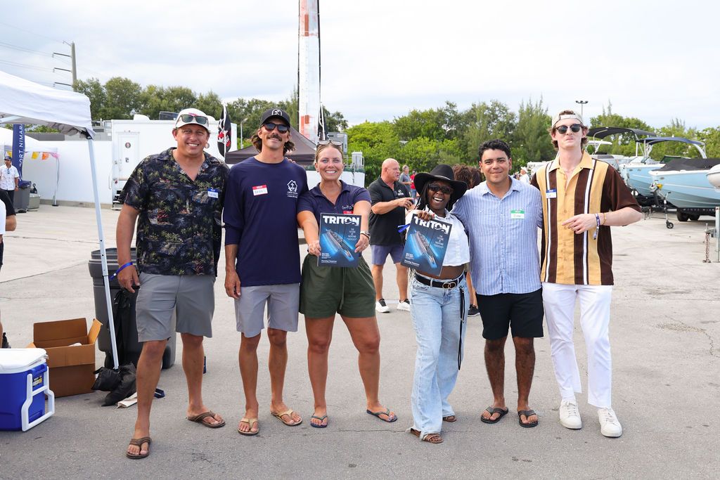 Guests networking at The Triton's Crew, Captains & Connections event at Nautical Ventures Marina.
