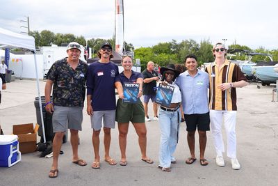 Guests networking at The Triton's Crew, Captains & Connections event at Nautical Ventures Marina.