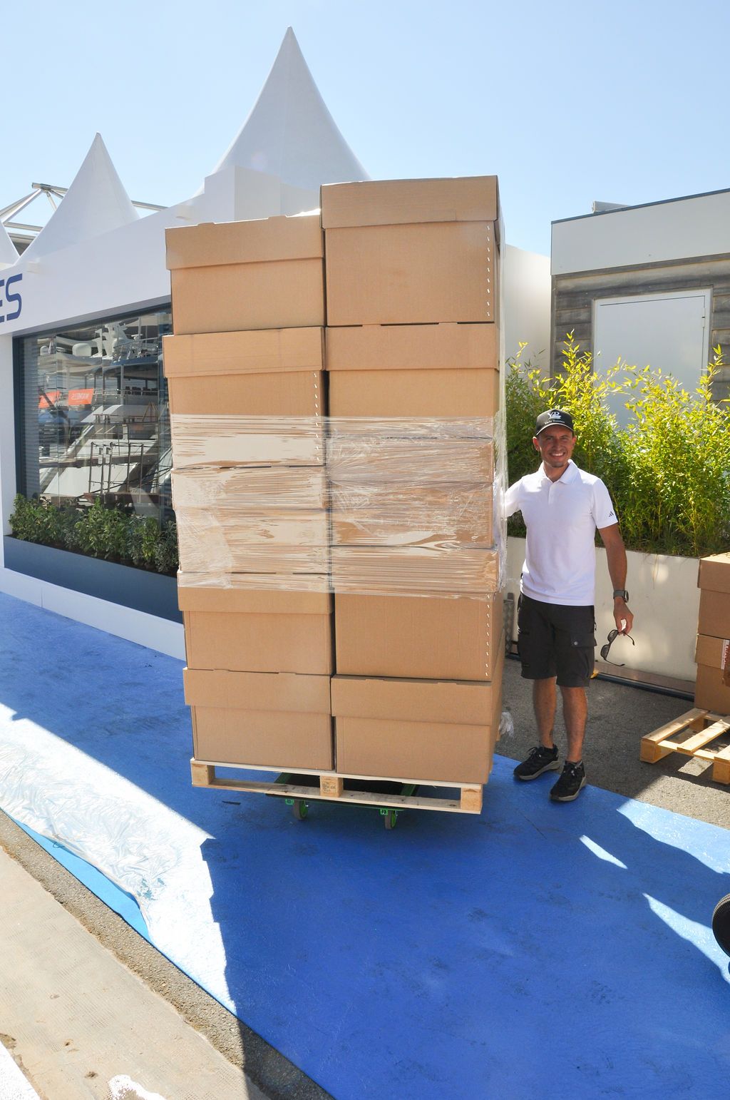 Yachts and crew on the docks at the 2026 Monaco Yacht Show in Port Hercule, Monaco.