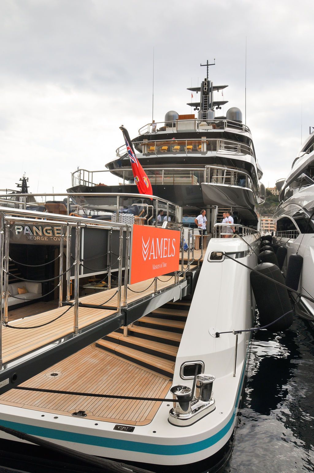 Yachts and crew on the docks at the 2026 Monaco Yacht Show in Port Hercule, Monaco.