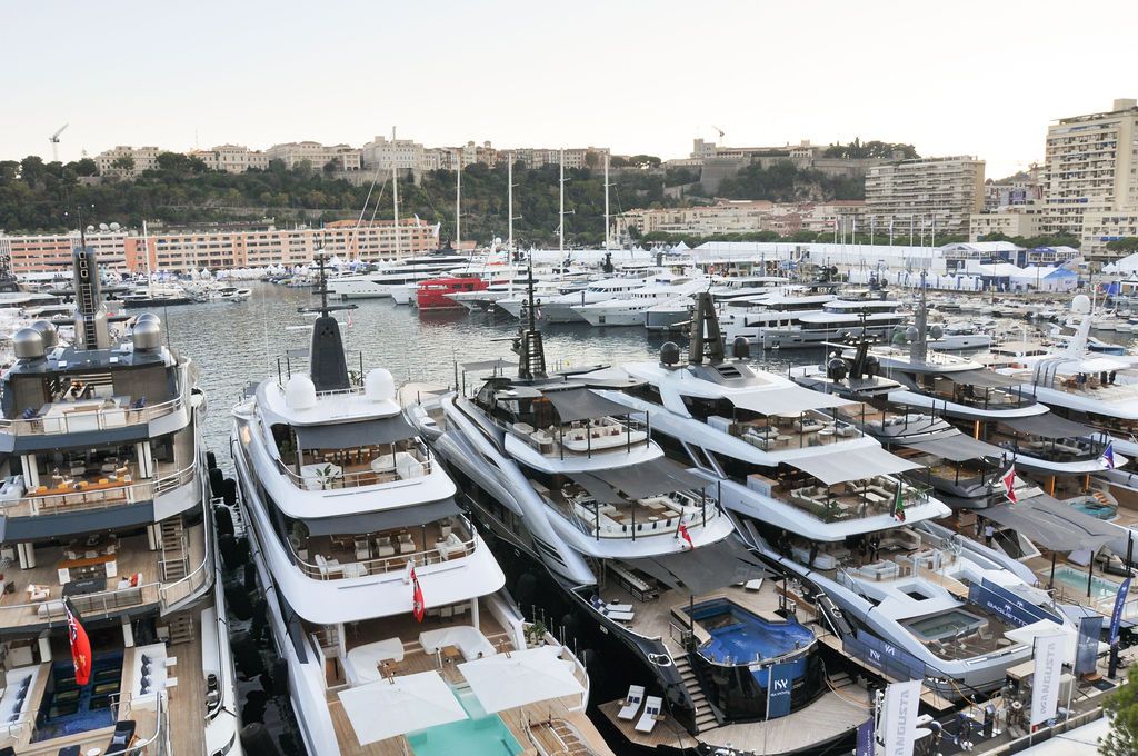Yachts and crew on the docks at the 2026 Monaco Yacht Show in Port Hercule, Monaco.