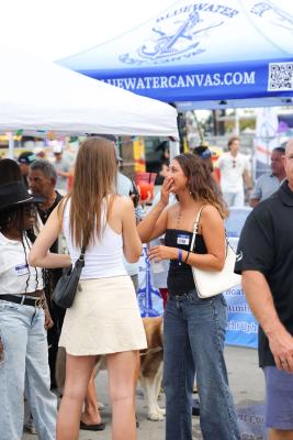 Guests networking at The Triton's Crew, Captains & Connections event at Nautical Ventures Marina.