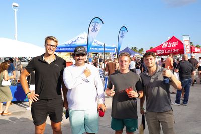 Guests networking at The Triton's Crew, Captains & Connections event at Nautical Ventures Marina.