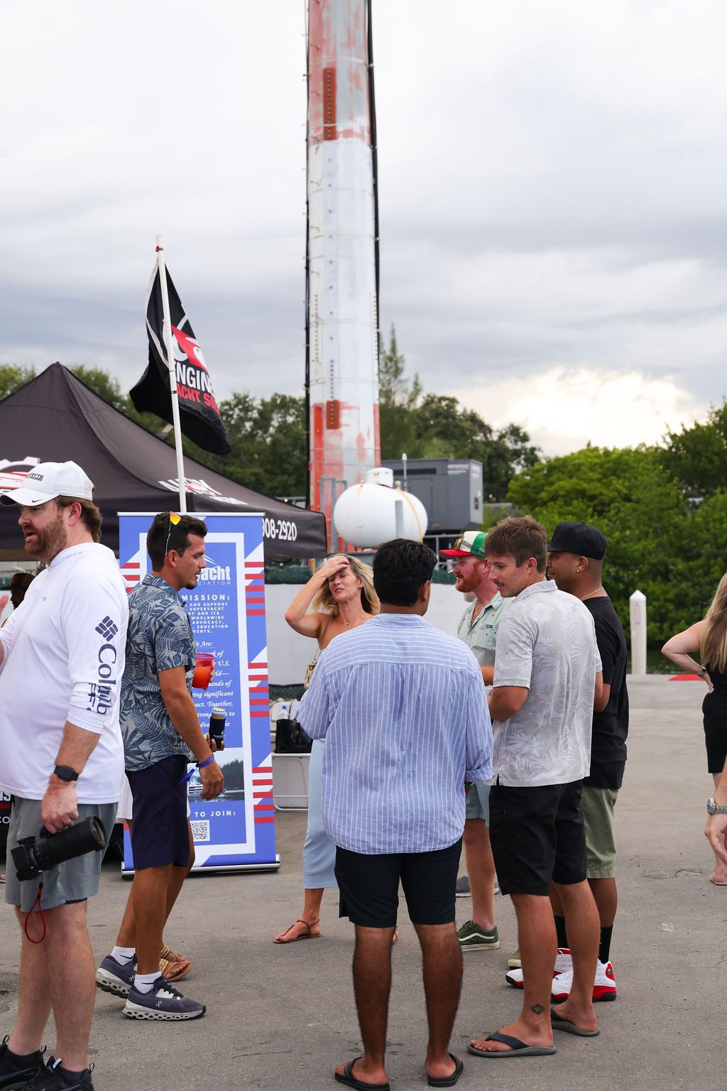 Guests networking at The Triton's Crew, Captains & Connections event at Nautical Ventures Marina.