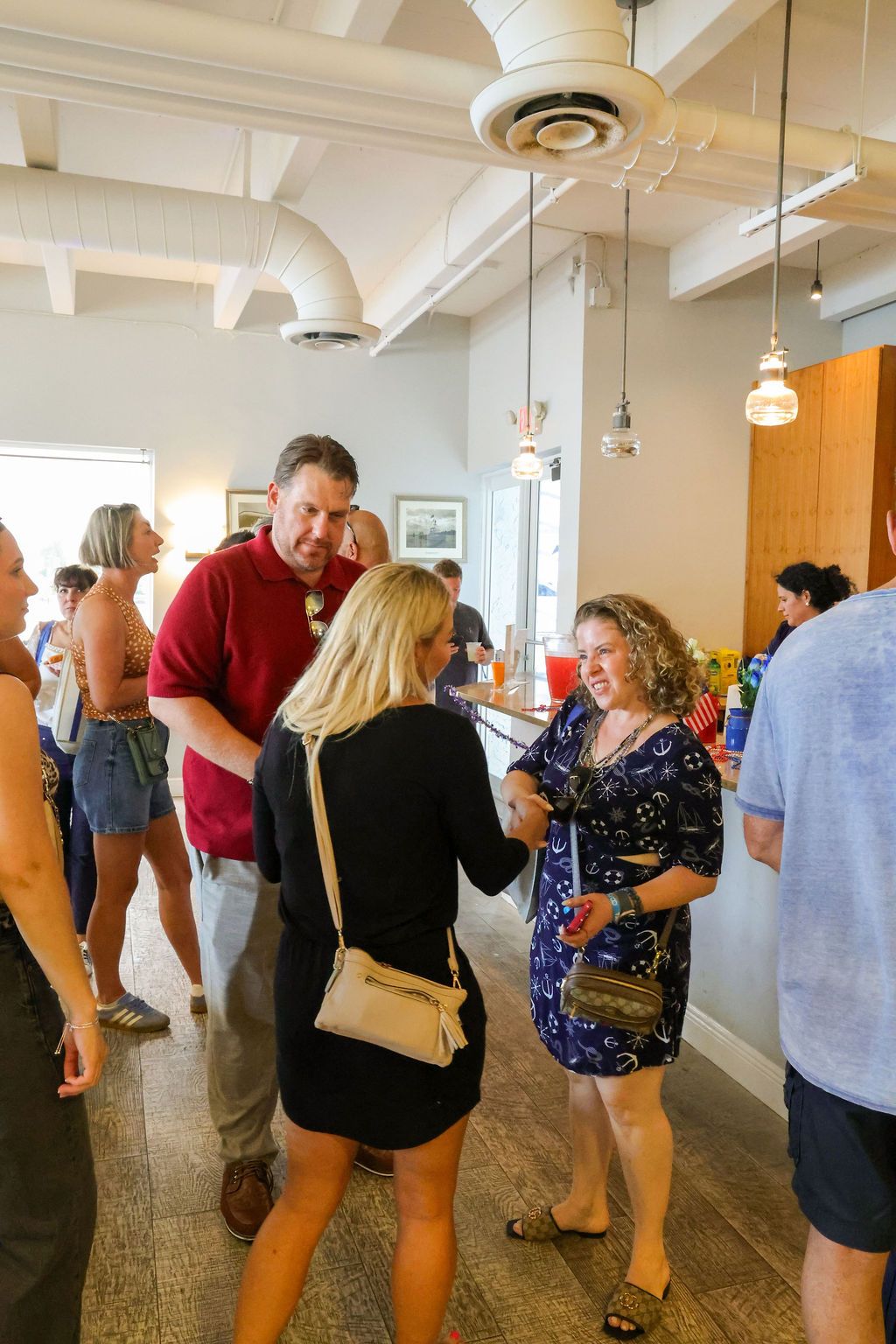 Guests and exhibitors at The Triton's Fall Triton Expo at Bahia Mar Yachting Center.