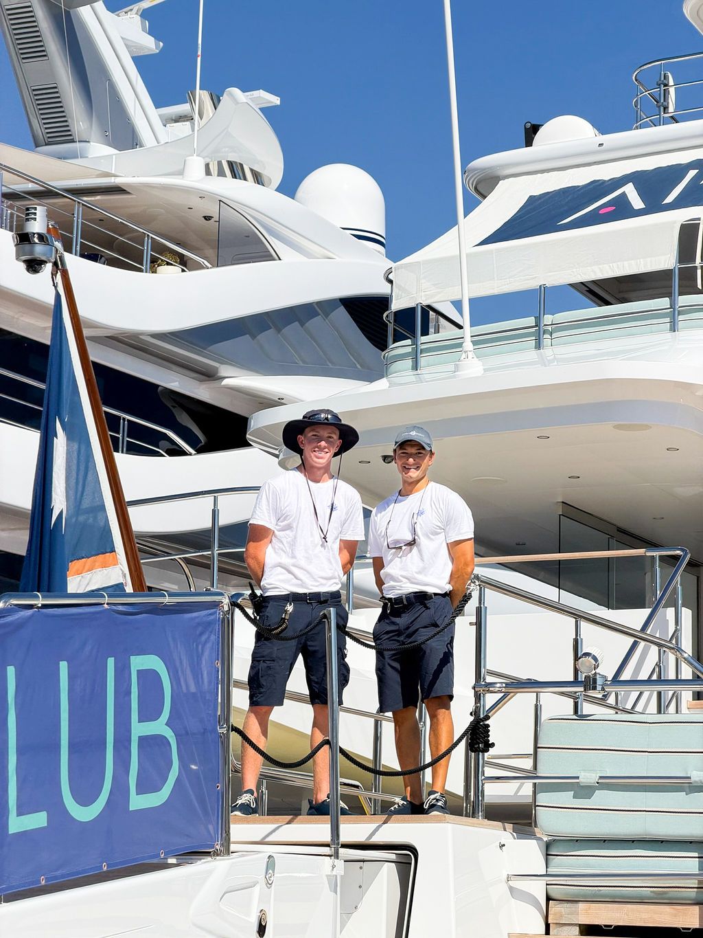 Yachts and crew on the docks at the 2026 Monaco Yacht Show in Port Hercule, Monaco.
