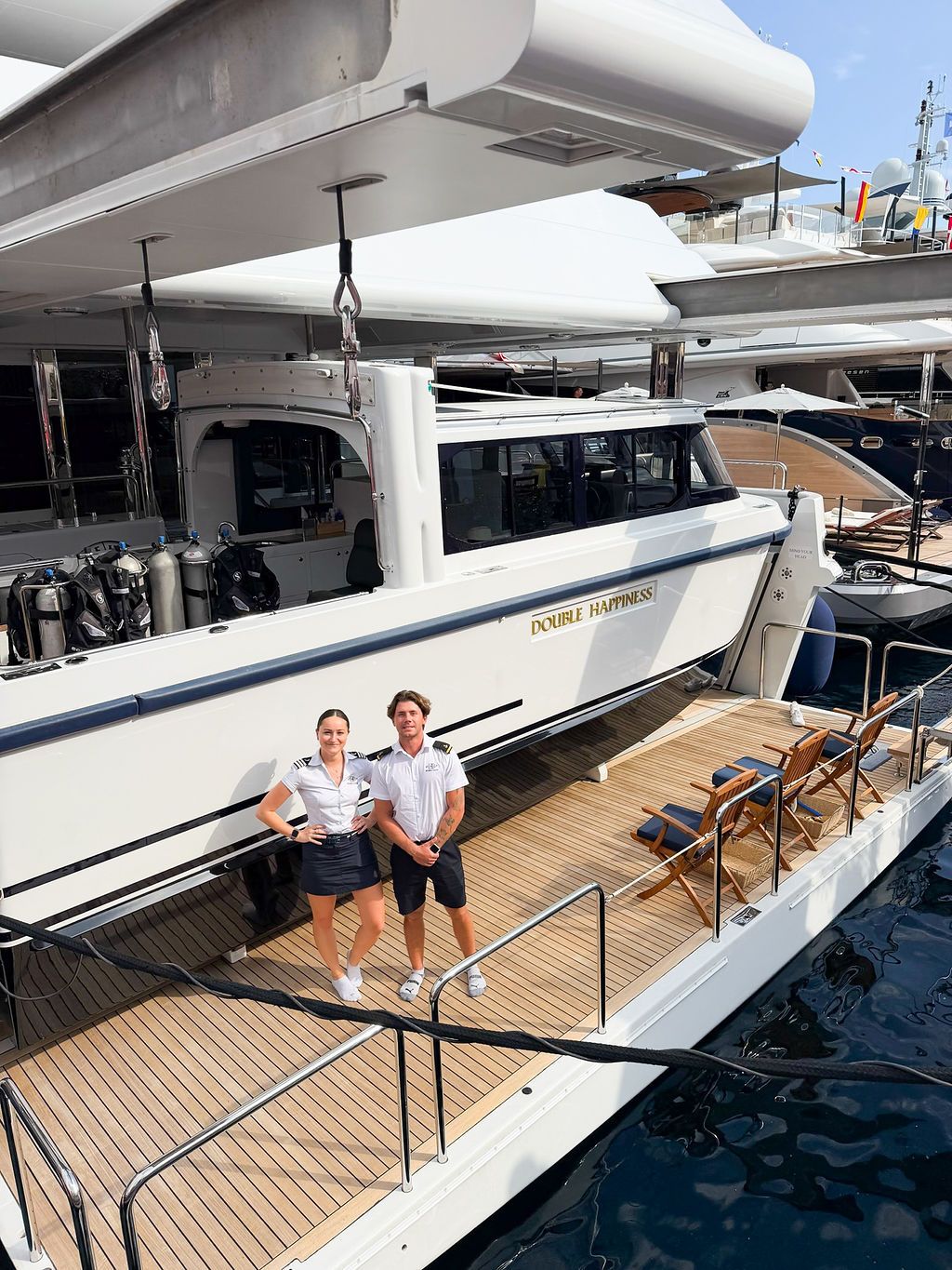 Yachts and crew on the docks at the 2026 Monaco Yacht Show in Port Hercule, Monaco.