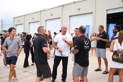 Guests networking at The Triton's Crew, Captains & Connections event at Nautical Ventures Marina.