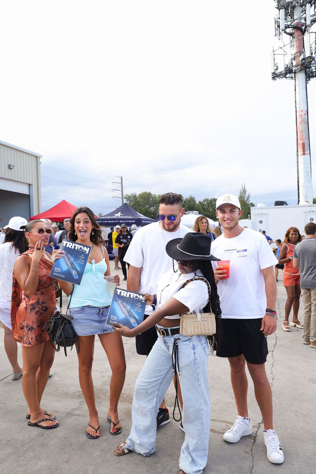 Guests networking at The Triton's Crew, Captains & Connections event at Nautical Ventures Marina.