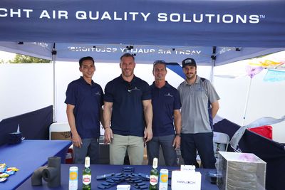 Guests networking at The Triton's Crew, Captains & Connections event at Nautical Ventures Marina.