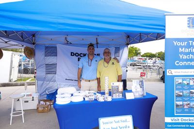 Guests networking at The Triton's Crew, Captains & Connections event at Nautical Ventures Marina.