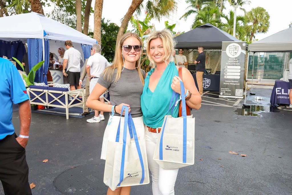 Guests and exhibitors at The Triton's Fall Triton Expo at Bahia Mar Yachting Center.