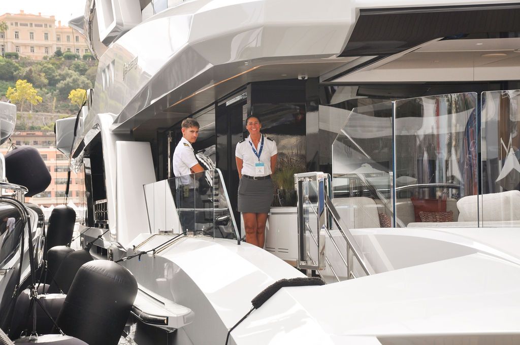 Yachts and crew on the docks at the 2026 Monaco Yacht Show in Port Hercule, Monaco.