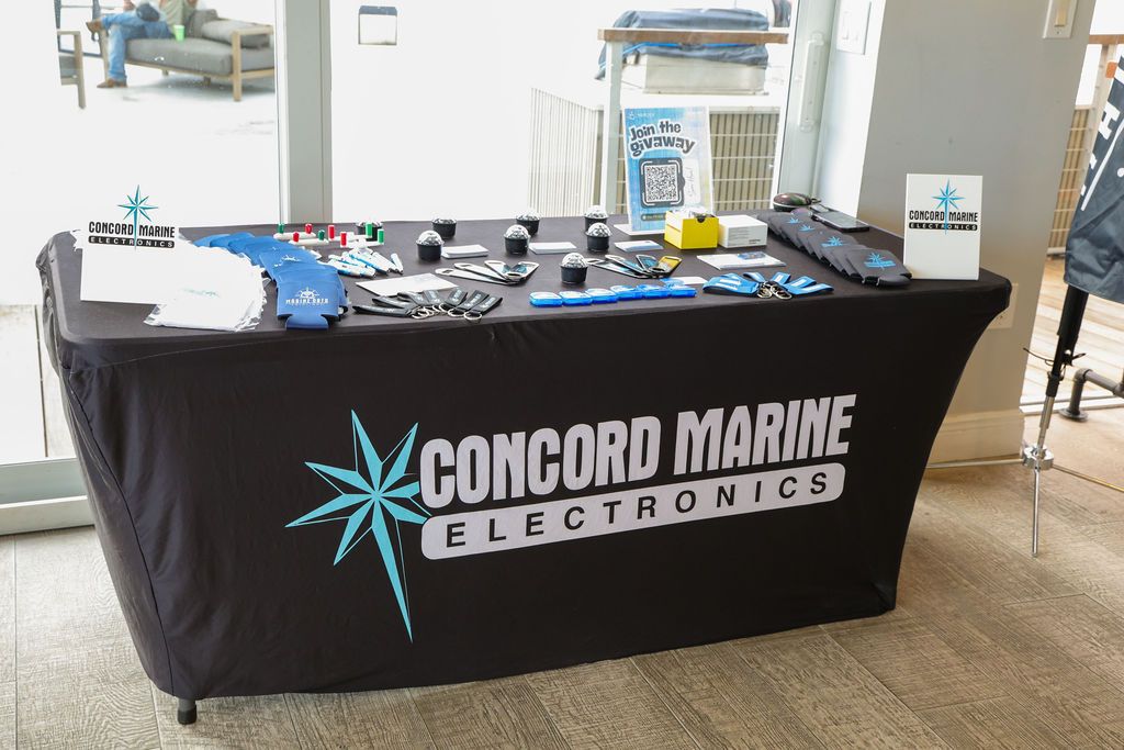 Guests and exhibitors at The Triton's Fall Triton Expo at Bahia Mar Yachting Center.