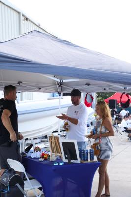 Guests networking at The Triton's Crew, Captains & Connections event at Nautical Ventures Marina.