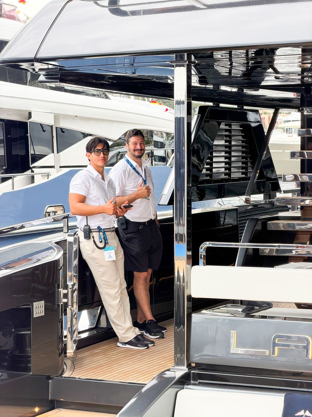 Yachts and crew on the docks at the 2026 Monaco Yacht Show in Port Hercule, Monaco.