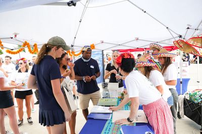 Guests networking at The Triton's Crew, Captains & Connections event at Nautical Ventures Marina.