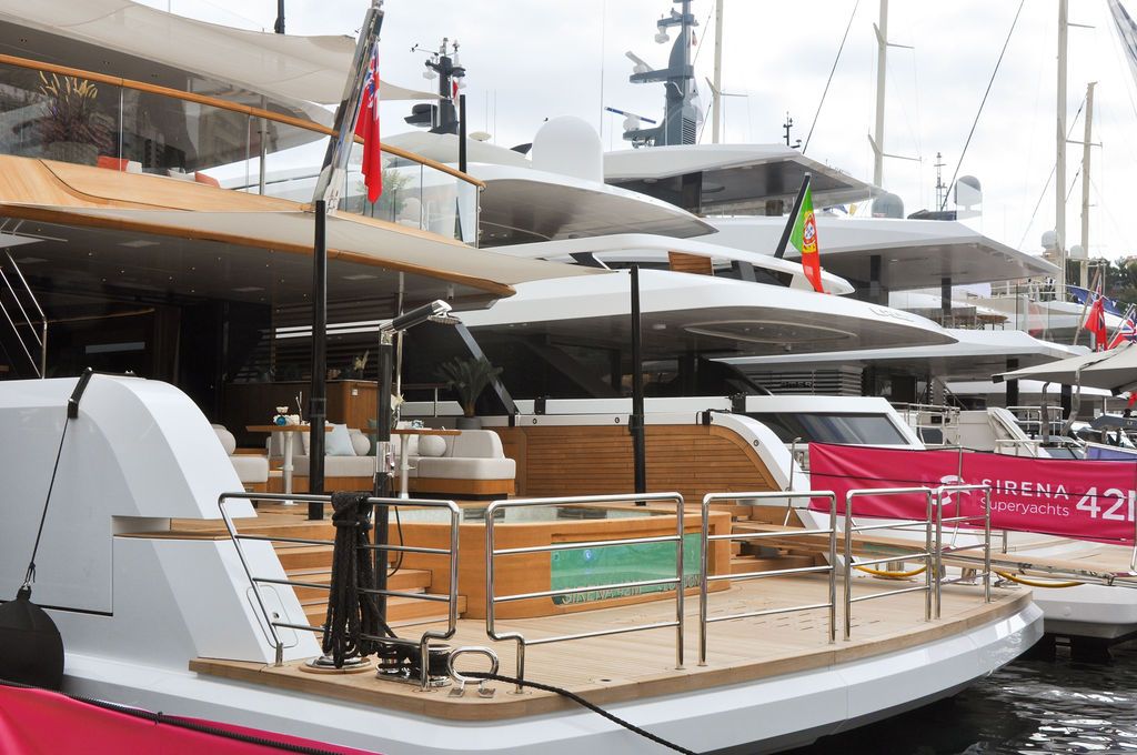 Yachts and crew on the docks at the 2026 Monaco Yacht Show in Port Hercule, Monaco.