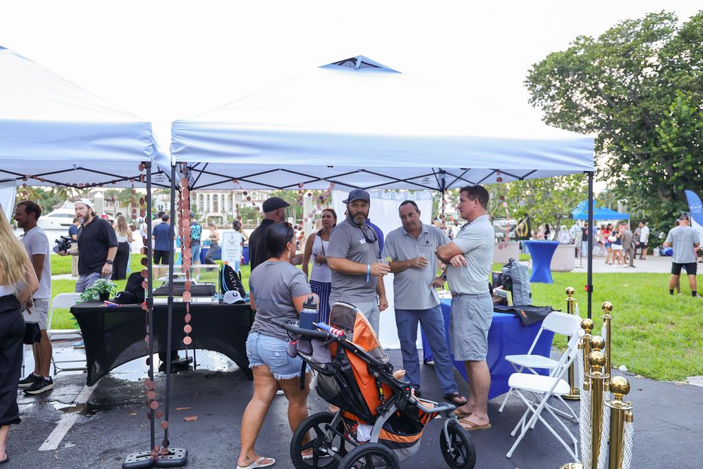 Guests and exhibitors at The Triton's Fall Triton Expo at Bahia Mar Yachting Center.
