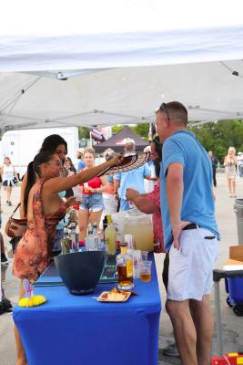 Guests networking at The Triton's Crew, Captains & Connections event at Nautical Ventures Marina.