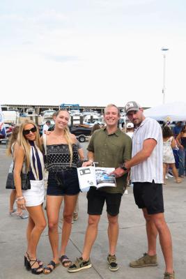 Guests networking at The Triton's Crew, Captains & Connections event at Nautical Ventures Marina.