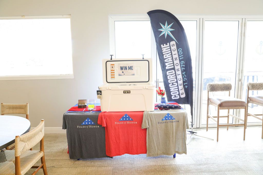 Guests and exhibitors at The Triton's Fall Triton Expo at Bahia Mar Yachting Center.