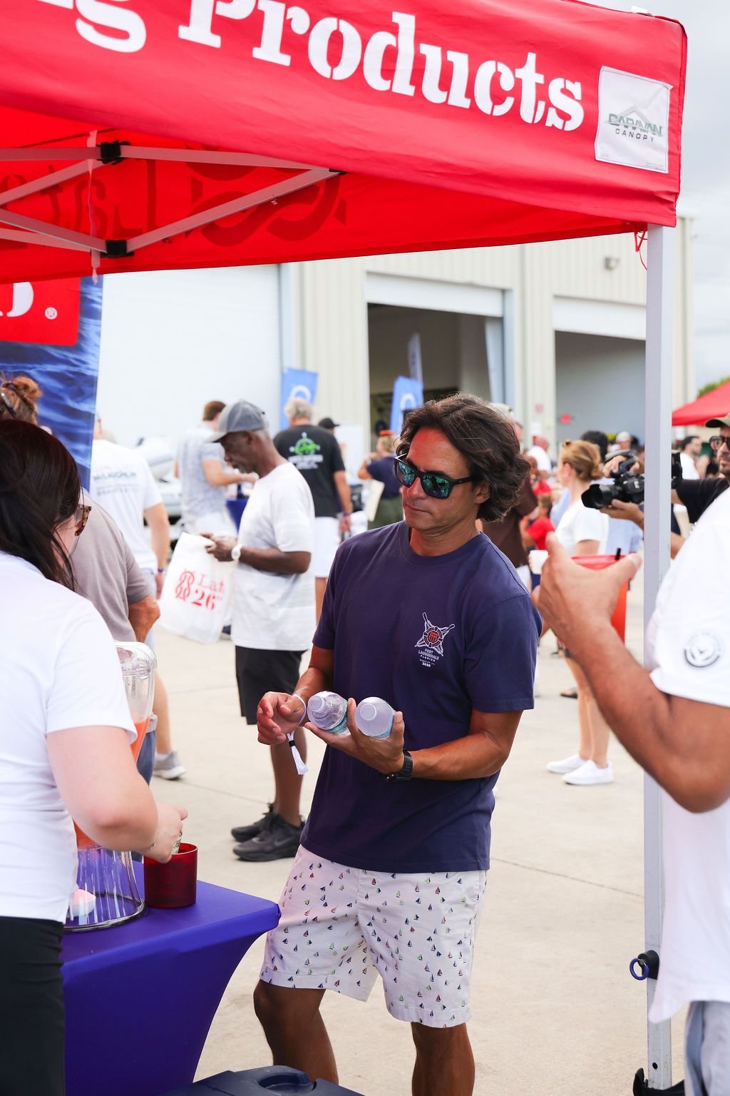 Guests networking at The Triton's Crew, Captains & Connections event at Nautical Ventures Marina.